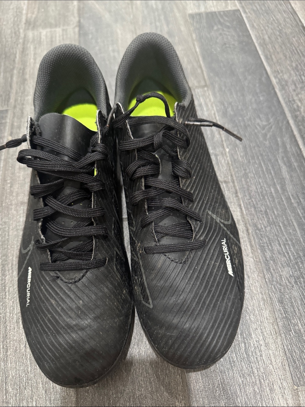 Nike Black Mercurial Kids Athletic Cleats with Neon Green Insole